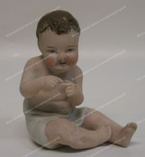 Скульптура "Играющий мальчик". Начало XX в. Германия. Фарфор (бисквит). Тонировка.